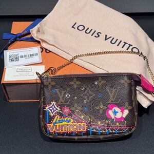 Brand NEW Louis Vuitton Vivienne Monogram Mini Pochette M69752.